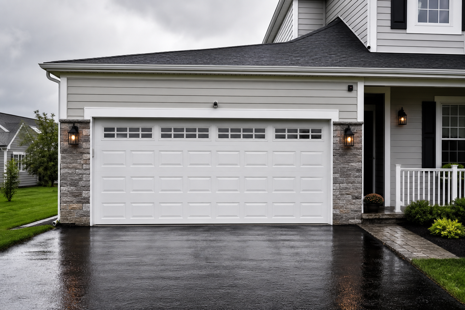 Modern garage door in East Brunswick after rain with visible weather seals